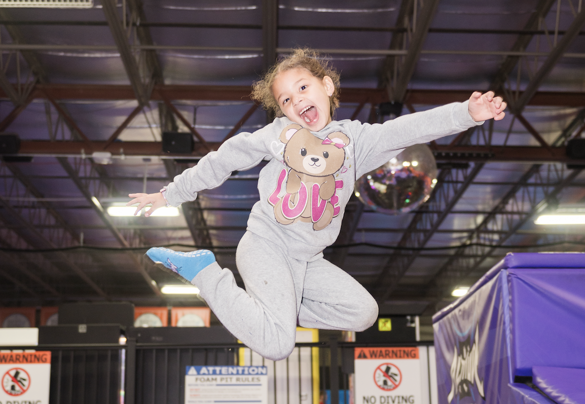 child jumping at altitude trampoline park in Bloomington IL
